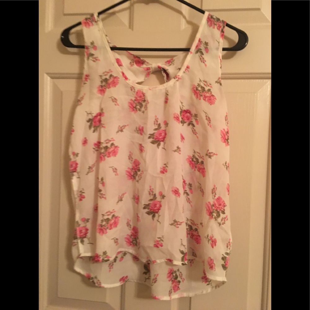 Floral top with a bow.